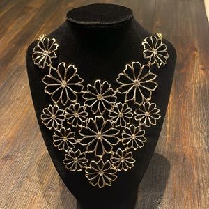 Gold color necklace, flowers with rhinestone centers